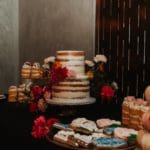 The dessert table was beautiful and surrounded in those pink and red pops of color
